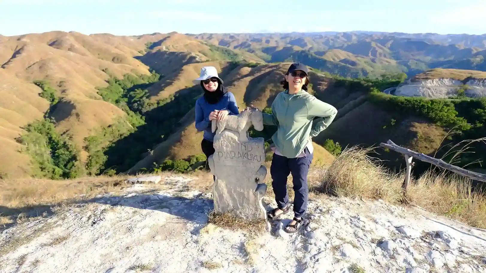 Travellers on Piarakuku Hill above the Sumba savanna